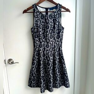 Women’s white dress with black lace size x small